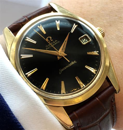 omega seamaster schwarz gold